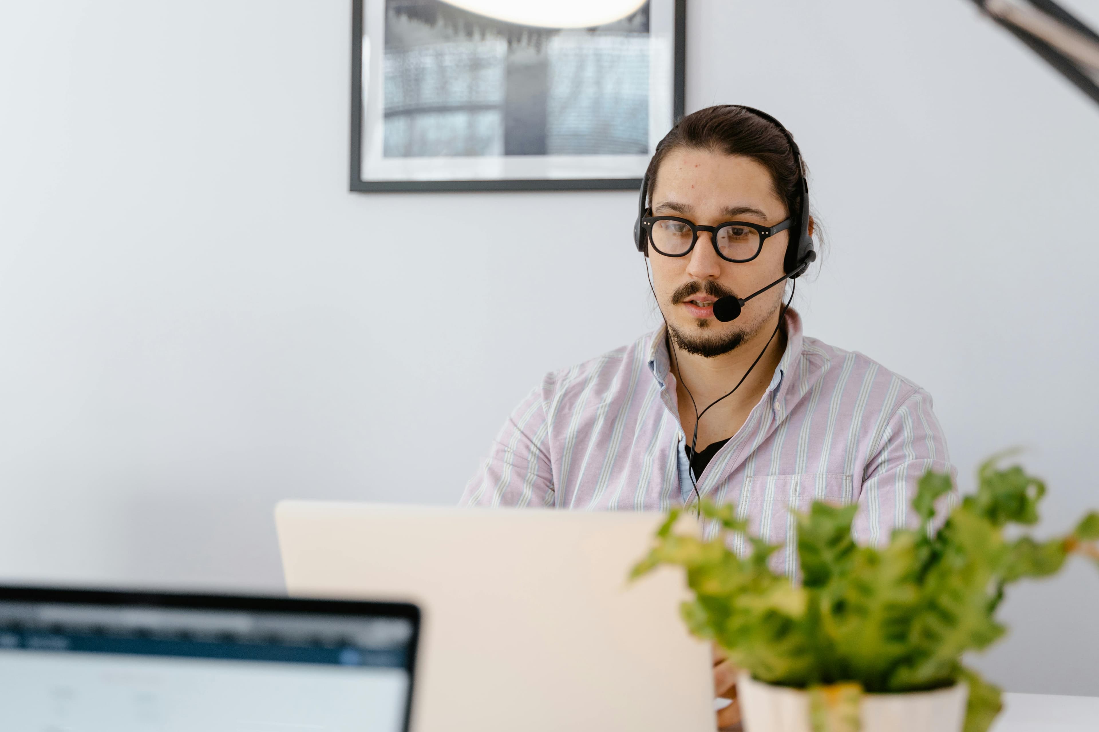 Customer support representative with headset